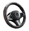 Couvre volant en cuir noir matelassé avec motif ligne orange Ø38cm