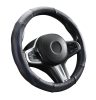 Couvre volant en cuir noir matelassé avec motif ligne bleue Ø38cm