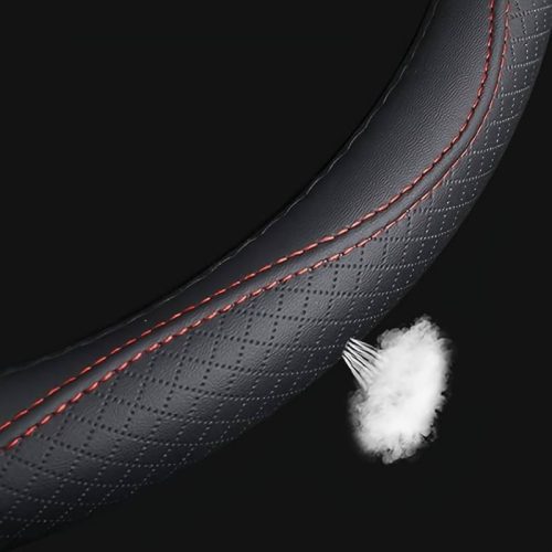 Couvre volant en cuir noir matelassé avec motif carreaux et surpiqûres rouges Ø38cm